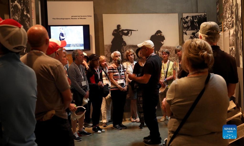 People visit Yad Vashem, the World Holocaust Remembrance Center, in Jerusalem on April 26, 2022. Israel's national annual Holocaust remembrance day will be marked on Wednesday and Thursday, in remembering the 6 million Jews who perished in the Holocaust during the Second World War. (Photo by Gil Cohen Magen/Xinhua)
