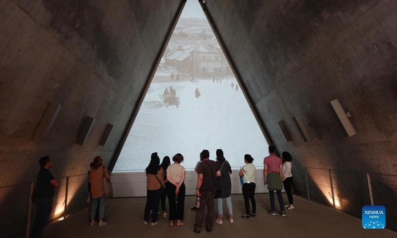 People visit Yad Vashem, the World Holocaust Remembrance Center, in Jerusalem on April 26, 2022. Israel's national annual Holocaust remembrance day will be marked on Wednesday and Thursday, in remembering the 6 million Jews who perished in the Holocaust during the Second World War. (Xinhua/Wang Zhuolun)
