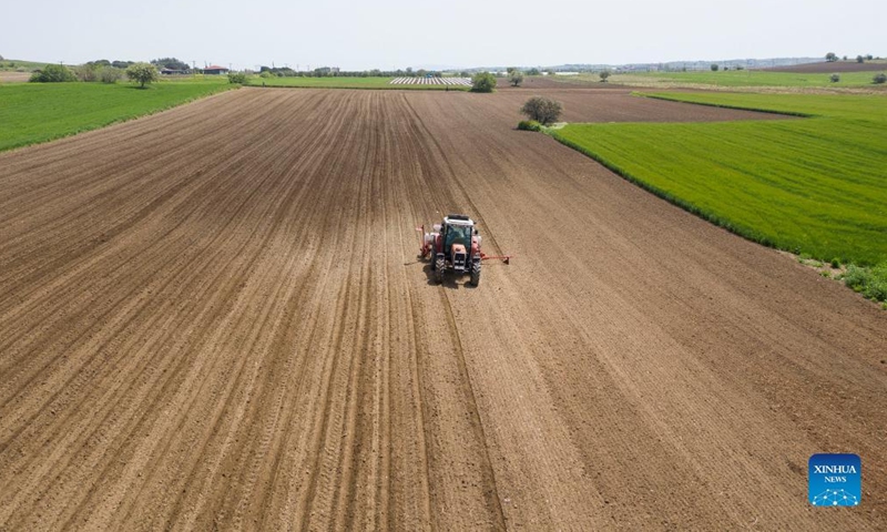 Aerial photo taken on April 25, 2022 shows a tractor sowing cotton seeds in a farm near the village of Plagiari, near the city of Thessaloniki, Greece. According to the website of the European Commission, Greece is the largest cotton producer in Europe, accounting for about 80 percent of the cotton planting area in Europe.Photo:Xinhua