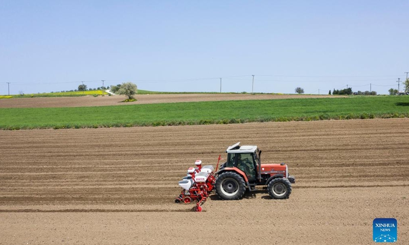 A tractor sows cotton seeds in a farm near the village of Plagiari, near the city of Thessaloniki, Greece, April 25, 2022. According to the website of the European Commission, Greece is the largest cotton producer in Europe, accounting for about 80 percent of the cotton planting area in Europe.Photo:Xinhua