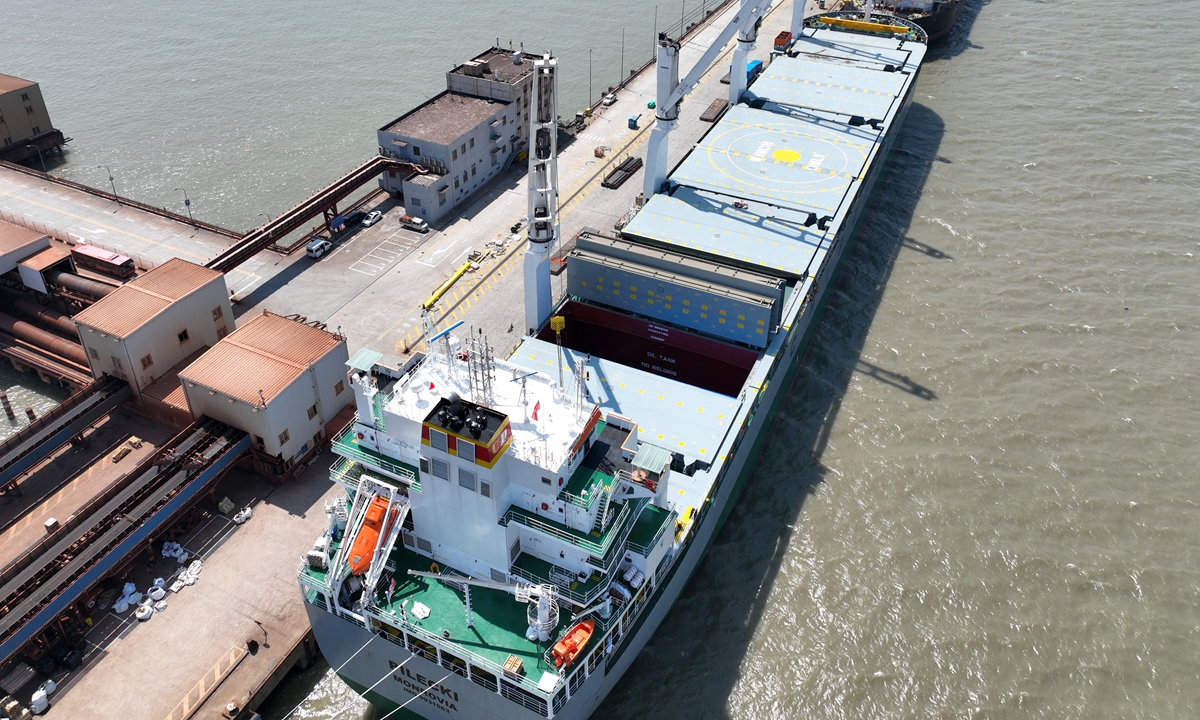 A heavy-lift ship, freshly rolled out from the shipyard at end-April, leaves a port in Shanghai for her maiden voyage, carrying complete components of a vaccine plant being exported to Morocco on May 5, 2022. China was the largest shipbuilder in the world in 2021, data showed. Photo: VCG