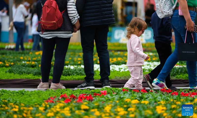 People visit St. George's Square with flowering display in Valletta, capital of Malta, on April 30, 2022. The ninth edition of the Valletta Green Festival takes place between April 28 and May 1 with this year's theme natural habitats. (Photo by Jonathan Borg/Xinhua)