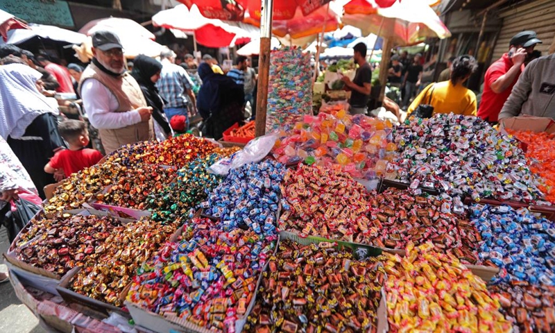 People visit a market ahead of Eid al-Fitr in Beirut, Lebanon, on April 30, 2022. (Xinhua/Bilal Jawich)