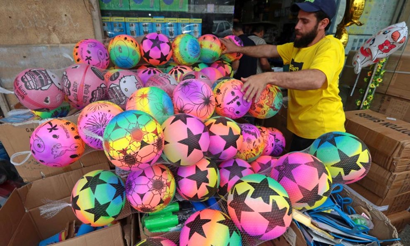 A toy seller prepares for the upcoming Eid al-Fitr in Beirut, Lebanon, on April 30, 2022. (Xinhua/Bilal Jawich)