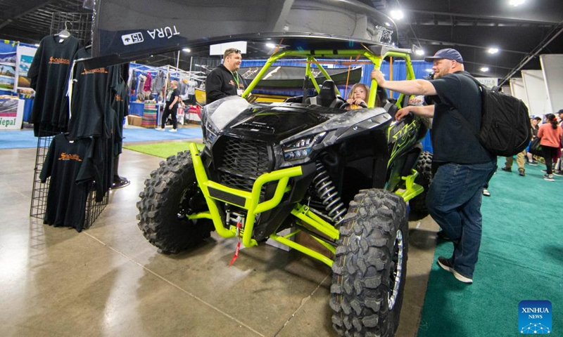 People experience an ATV during the 2022 Outdoor Adventure Show in Mississauga, the Greater Toronto Area, Canada, on May 1, 2022.Photo:Xinhua