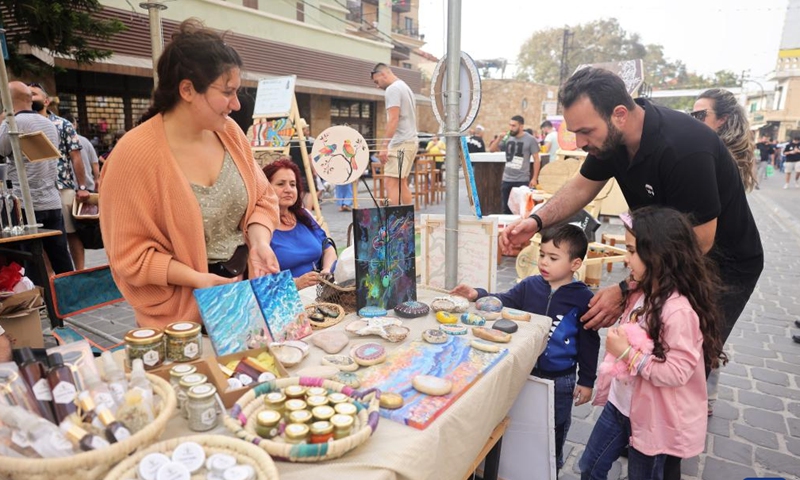 People visit a spring fair in Batroun, northern Lebanon, on April 30, 2022.Photo:Xinhua
