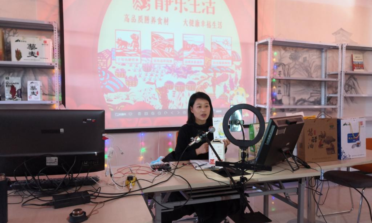 Yao Yanmei sells agricultural products via livestreaming in Jingle County, north China's Shanxi Province, Jan. 17, 2021. Photo:Xinhua