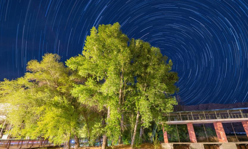 Composite photo shows star trails over Potala Palace in Lhasa, southwest China's Tibet Autonomous Region, May 4, 2022. (Xinhua)