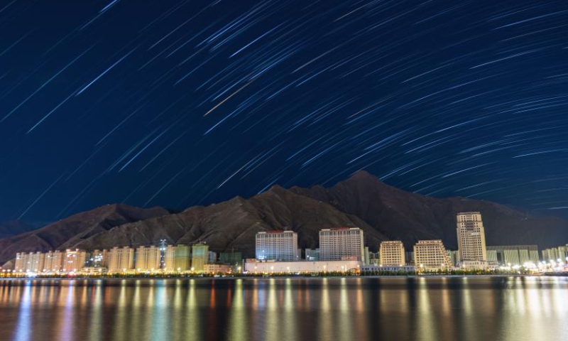 Composite photo shows star trails over Potala Palace in Lhasa, southwest China's Tibet Autonomous Region, May 4, 2022. (Xinhua)