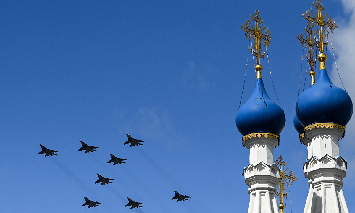 Russian MiG-29smt fighter jets fly over downtown Moscow during a rehearsal for the WWII Victory Parade on May 4, 2022. Russia will celebrate the 77th anniversary of the 1945 victory over Nazi Germany on May 9. Photo: AFP