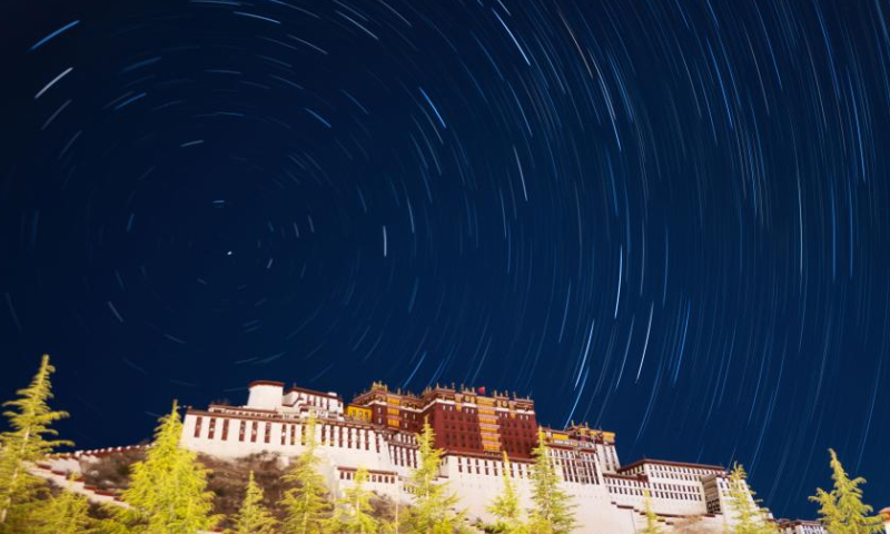 Composite photo shows star trails over Potala Palace in Lhasa, southwest China's Tibet Autonomous Region, May 4, 2022. (Xinhua)