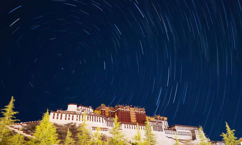 Composite photo shows star trails over Potala Palace in Lhasa, southwest China's Tibet Autonomous Region, May 4, 2022. (Xinhua)