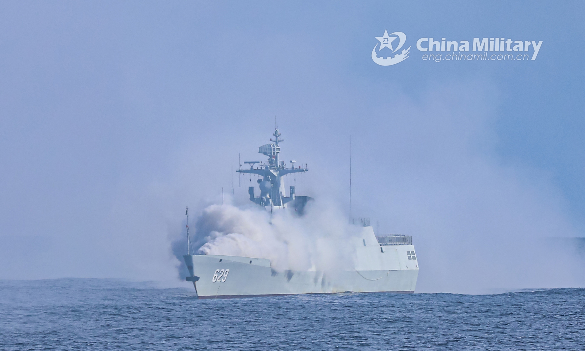 The photo taken on April 6, 2022 shows a frigate releases smoke to take cover during a combat training exercise somewhere in the South China Sea staged by a frigate flotilla with the navy under the PLA Southern Theatre Command in early April, 2022.Photo:eng.chinamil.com.cn