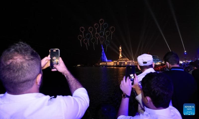 People watch drones show in north Jeddah, Saudi Arabia, May 2, 2022.Photo:Xinhua