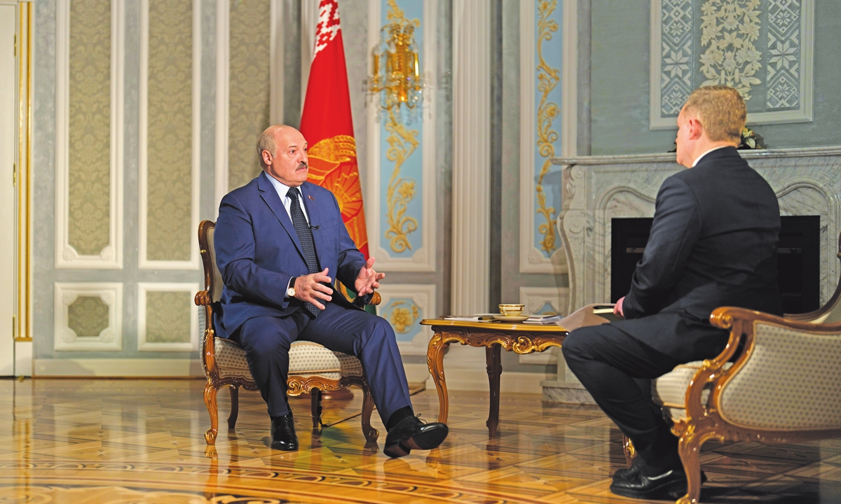 Belarus President Alexander Lukashenko (left) speaks during an interview with media at the Independence Palace in Minsk, Belarus on May 5, 2022. Lukashenko said he was doing “everything” to stop the conflict between Russia and Ukraine. Photo: VCG 