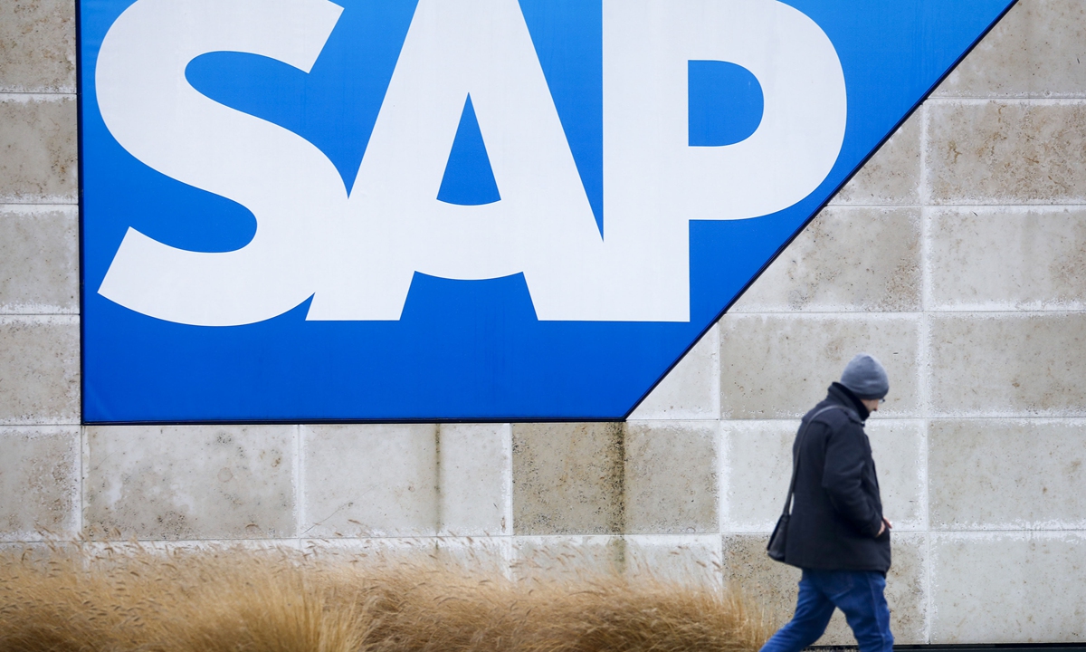 A visitor passes the SAP SE logo at the company's headquarter campus site in Walldorf, Germany, on  Jan. 28, 2020.Photo:cfp