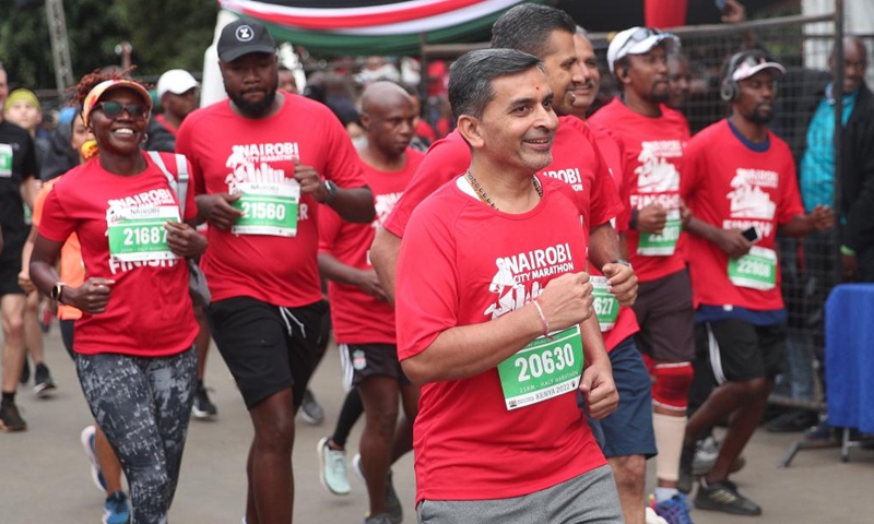 Runners participate in the half marathon during the Nairobi City Marathon in Nairobi, Kenya, May 8, 2022. (Xinhua/Long Lei)