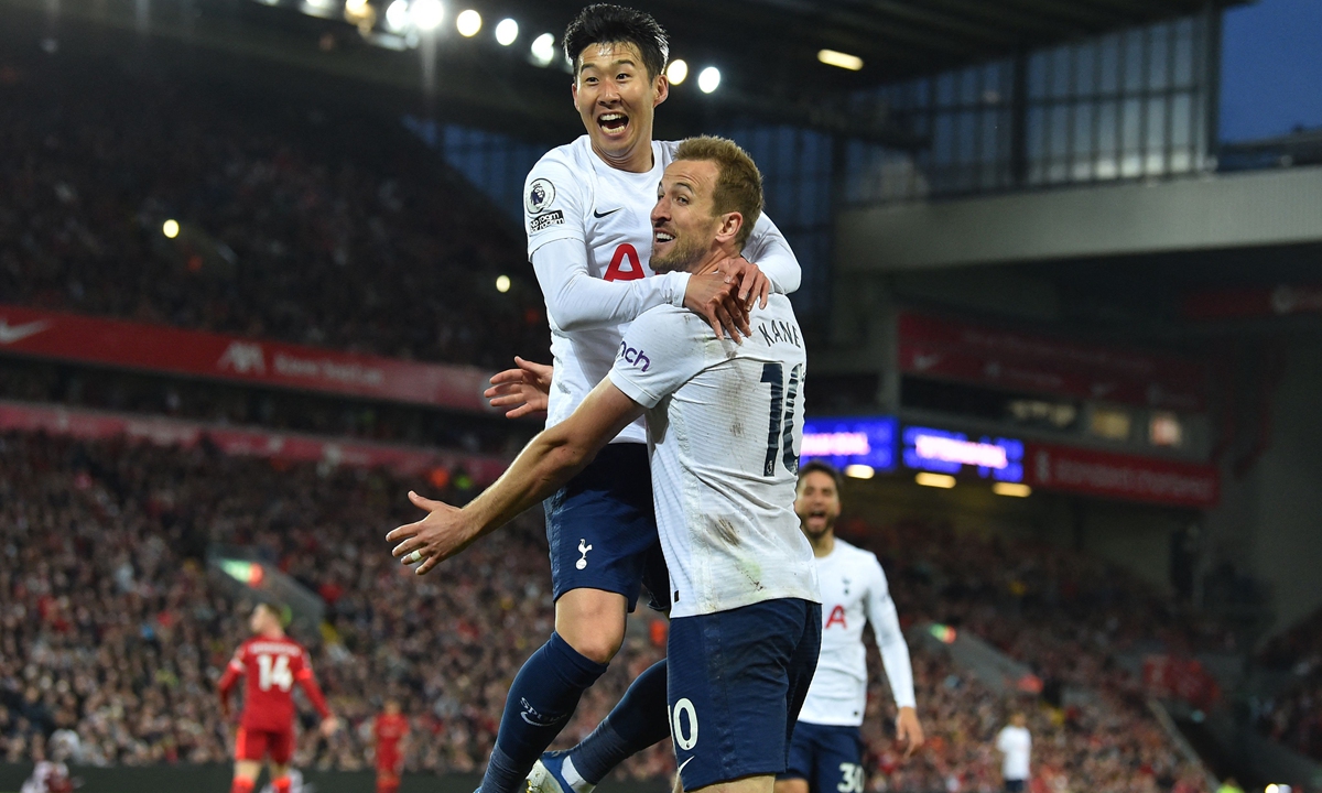 Tottenham Hotspur's South Korean striker Son Heung-min (left) celebrates with English striker Harry Kane after scoring the opening goal of the match against Liverpool at Anfield in Liverpool, England on May 7, 2022. Photo: VCG