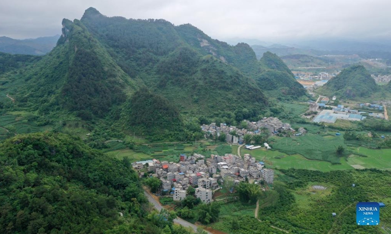 Aerial photo taken on May 8, 2022 shows rural scenery of Bama Yao Autonomous County in south China's Guangxi Zhuang Autonomous Region. (Xinhua/Lu Boan)