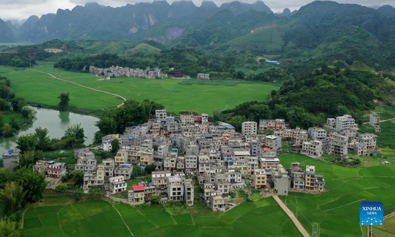 Aerial photo taken on May 8, 2022 shows rural scenery of Bama Yao Autonomous County in south China's Guangxi Zhuang Autonomous Region. (Xinhua/Lu Boan)