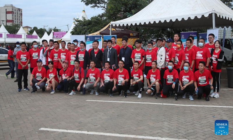 Chinese contestants pose for a group photo before the Nairobi City Marathon in Nairobi, Kenya, May 8, 2022. (Xinhua/Long Lei)