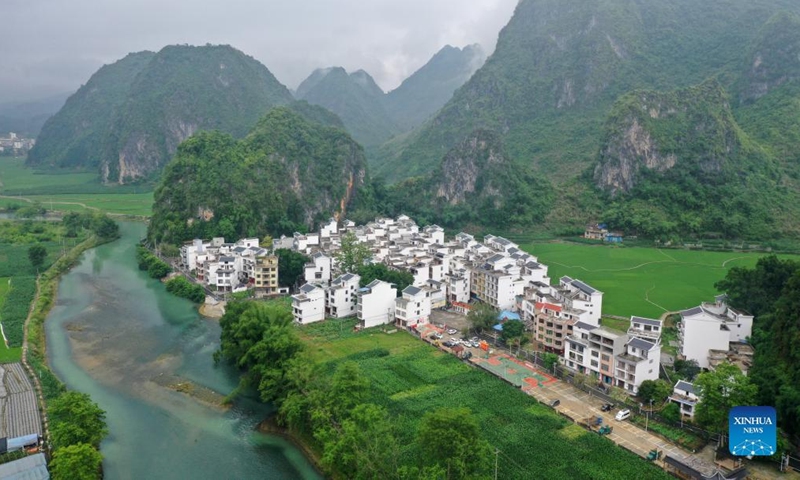Aerial photo taken on May 8, 2022 shows rural scenery of Bama Yao Autonomous County in south China's Guangxi Zhuang Autonomous Region. (Xinhua/Lu Boan)