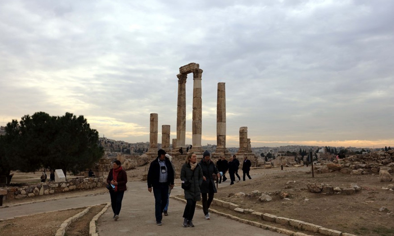 People visit the Citadel archaeological site in Amman, Jordan, on Dec. 28, 2021.Photo:Xinhua