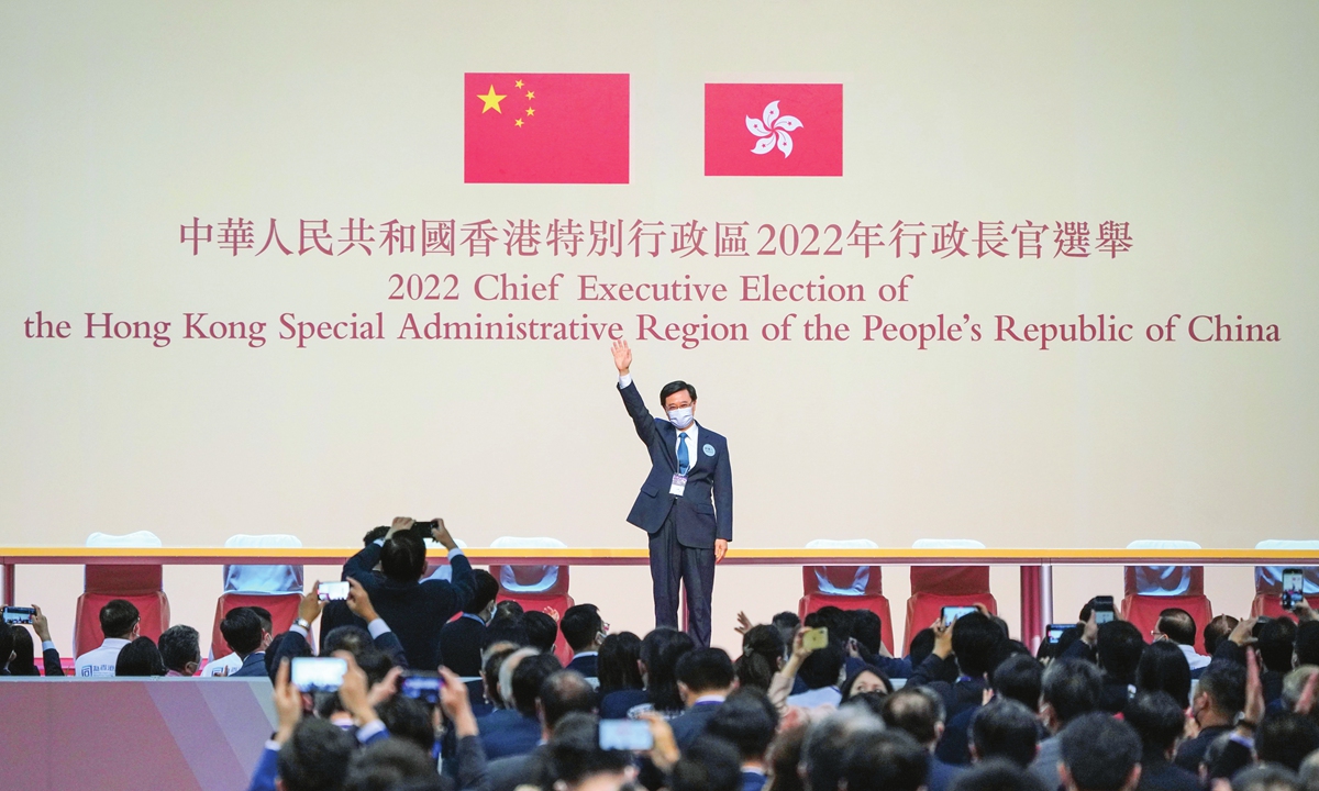 John Lee waves to people after winning the election of the sixth-term chief executive of the Hong Kong Special Administrative Region on May 8, 2022. Photo: cnsphoto