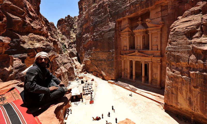 Tourists visit the reopened ancient city of Petra in Jordan June 20, 2020.Photo:Xinhua