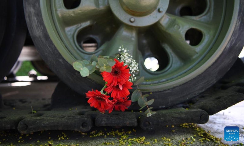 Flowers are presented on the wheel of a tank to commemorate the 77th anniversary of the end of World War II in Europe, known as Victory in Europe Day, at German-Russian Museum in Berlin, capital of Germany, on May 8, 2022.Photo:Xinhua