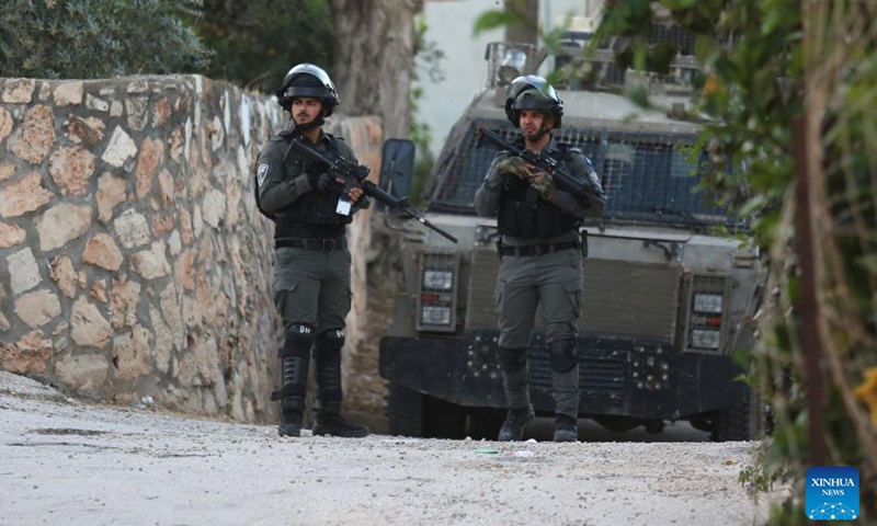 Israeli security forces launch a raid on the houses of the two Palestinian suspects in the village of Romana near the West Bank city of Jenin, on May 8, 2022.Photo:Xinhua