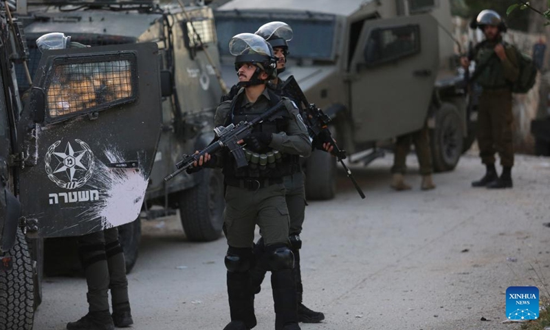 Israeli security forces launch a raid on the houses of the two Palestinian suspects in the village of Romana near the West Bank city of Jenin, on May 8, 2022.Photo:Xinhua