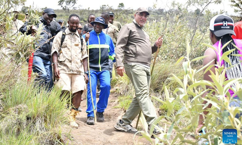 Najib Balala (2nd R), the cabinet secretary of Tourism and Wildlife of Kenya, joins visitors in hiking Mt. Longonot National Park, Kenya, on May 7, 2022.Photo:Xinhua