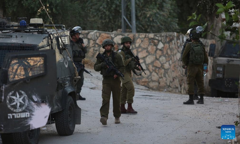 Israeli security forces launch a raid on the houses of the two Palestinian suspects in the village of Romana near the West Bank city of Jenin, on May 8, 2022.Photo:Xinhua