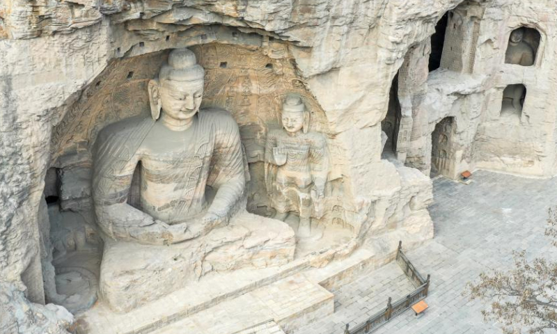 Aerial photo taken on May 11, 2022 shows a Buddha statue at the Yungang Grottoes in Datong, north China's Shanxi Province.

With 45 major caves and more than 51,000 statues, the 1,500-year-old Yungang Grottoes were listed as a UNESCO World Heritage Site in 2001. (Xinhua/Cao Yang)