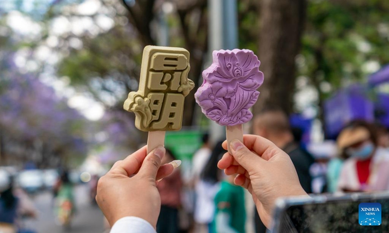 Jacaranda-themed ice creams are pictured in Kunming, southwest China's Yunnan Province, May 8, 2022. In recent years, the city has brought more vitality to its tourism markets by combining its jacaranda scenery and cultural creativity.(Photo: Xinhua)