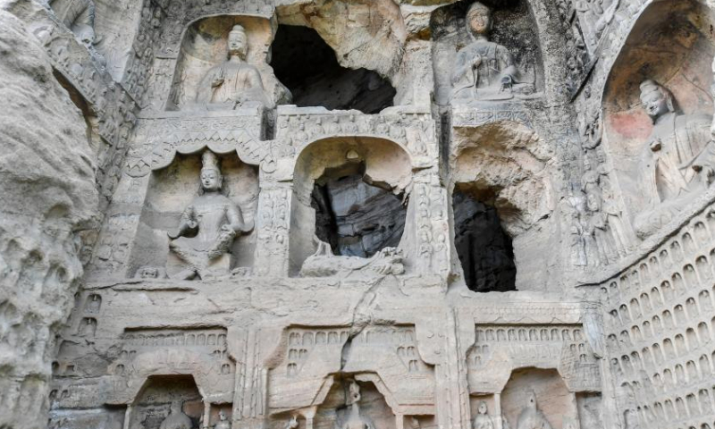 Stone statues are pictured at the Yungang Grottoes in Datong, north China's Shanxi Province, May 11, 2022.

With 45 major caves and more than 51,000 statues, the 1,500-year-old Yungang Grottoes were listed as a UNESCO World Heritage Site in 2001. (Xinhua/Cao Yang)