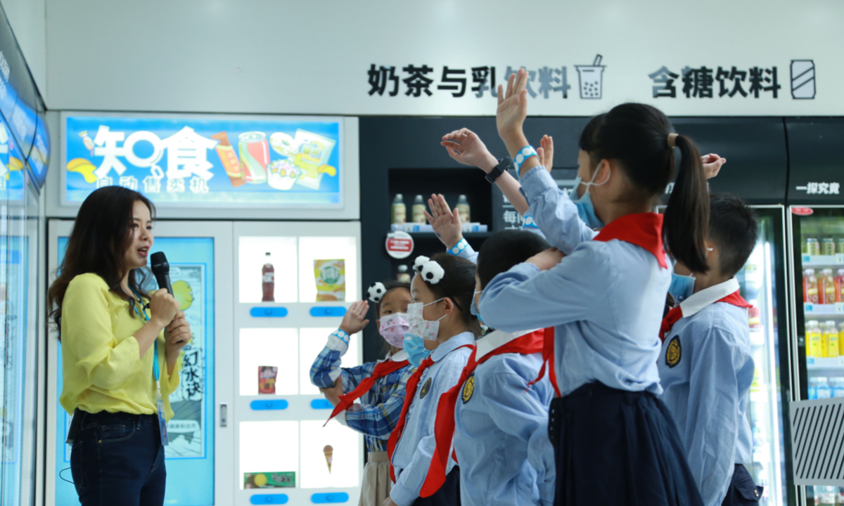 Children visit UNICEF’s ‘Know Your Food’ Convenience Store at the Chengdu Children and Youth Activity Centre, Sichuan Province, on 17 May 2022. UNICEF unveiled the ‘Know Your Food’ Convenience Store with a twist to highlight the content of sugar, fat and salt in popular pre-packaged foods, which contributes to an unhealthy food environment for children. The store is the centerpiece of UNICEF’s ‘Know Your Food’ campaign, launched to empower children and young people to make informed, healthy choices about their diet through improved nutrition literacy. @UNICEF/China/2022/Ma Ding