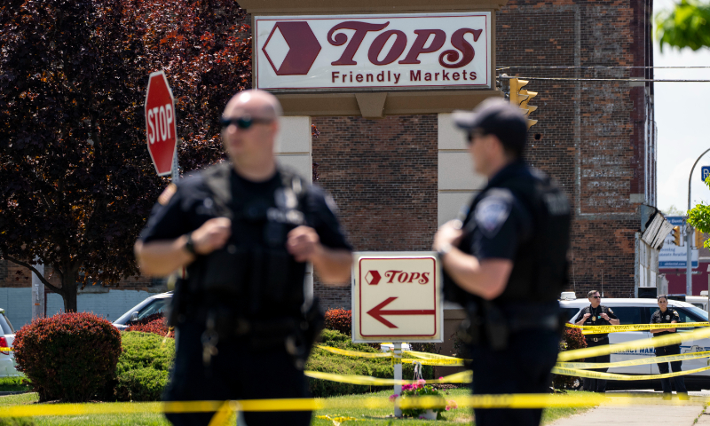 Law enforcement officials are seen at the scene of a mass shooting at Tops Friendly Market at Jefferson Avenue and Riley Street on May 15, 2022 in Buffalo, New York. Photo: VCG 