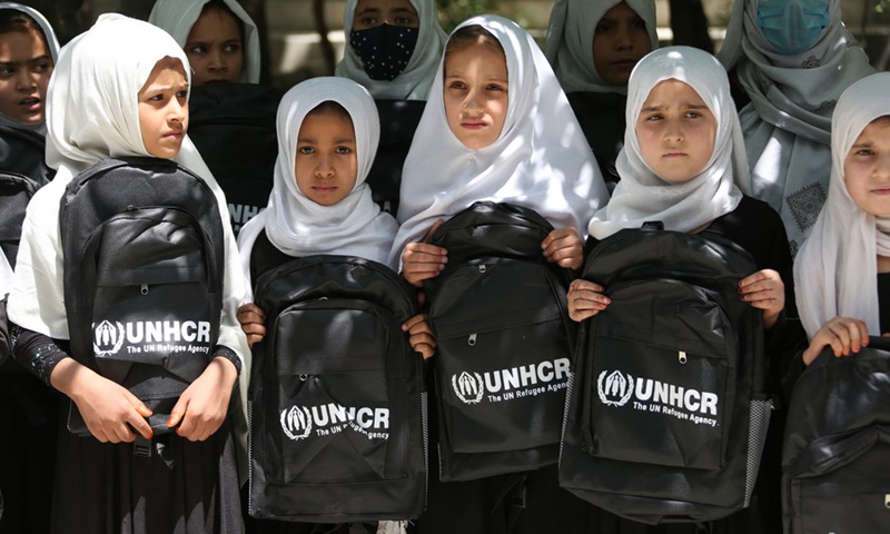 Afghan school children receive backpacks provided by China's South-South Cooperation Assistance Fund in cooperation with the United Nations Refugee Agency (UNHCR) in Kabul, Afghanistan, May 9, 2022.(Photo: Xinhua)