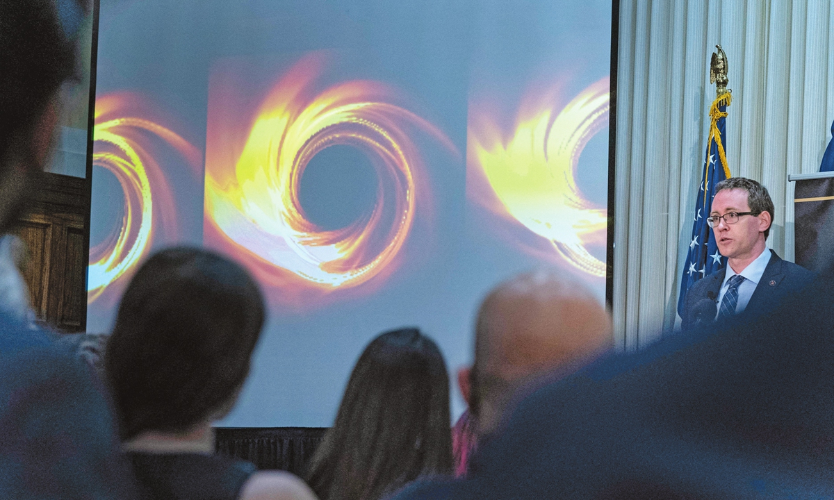 Astrophysicist at Center for Astrophysics Michael Johnson speaks during a news conference to announce the first image of Sagittarius A*, a supermassive black hole, at the center of the Milky Way Galaxy, in Washington, DC, on May 12, 2022. Photo: AFP