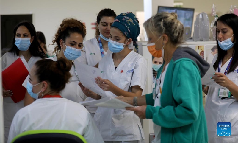Nurses take part in an event celebrating the International Nurses Day at Kaplan Hospital in Rehovot, Israel, May 11, 2022. The International Nurses Day falls on May 12.(Photo: Xinhua)