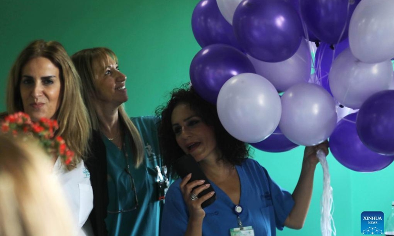 Nurses hold balloons during an event celebrating the International Nurses Day at Kaplan Hospital in Rehovot, Israel, May 11, 2022. The International Nurses Day falls on May 12.(Photo: Xinhua)