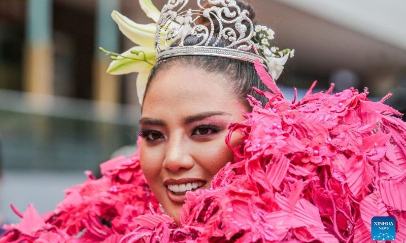 A contestant for the Binibining Pilipinas (Miss Philippines) 2022 participates in the Flores de Mayo (Flowers of May) procession in Quezon City, the Philippines, May 14, 2022. A total of 40 contestants will vie for the Binibining Pilipinas 2022 beauty pageant this year.Photo:Xinhua