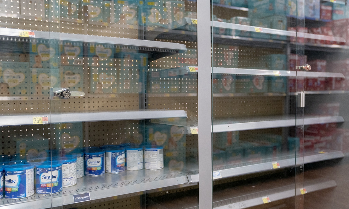 Grocery store shelves where baby formula is typically stocked are locked and nearly empty in Washington, DC, on May 11, 2022. It's a parent's worst nightmare. The United States is in the grip of a severe shortage of baby formula. Photo: AFP