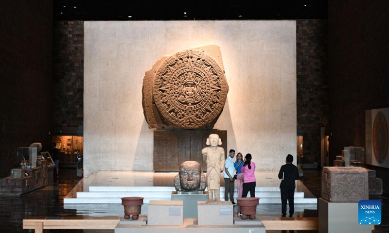 Photo taken on May 10, 2022 shows the Stone of the Sun (rear) at the National Museum of Anthropology in Mexico City, Mexico. The Stone of the Sun highlights the Sun's role in Aztec belief and religion. (Xinhua/Xin Yuewei)