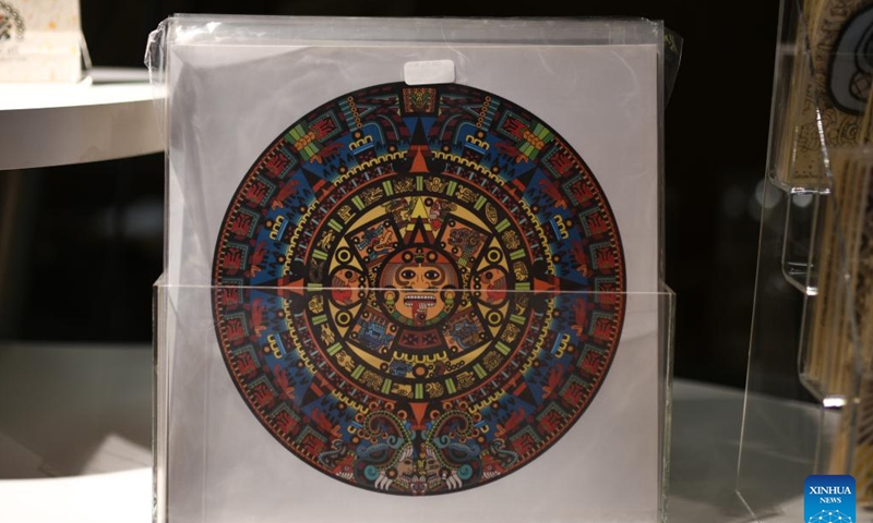Photo taken on May 10, 2022 shows a souvenir featuring the Stone of the Sun at the National Museum of Anthropology in Mexico City, Mexico. The Stone of the Sun highlights the Sun's role in Aztec belief and religion. (Xinhua/Xin Yuewei)