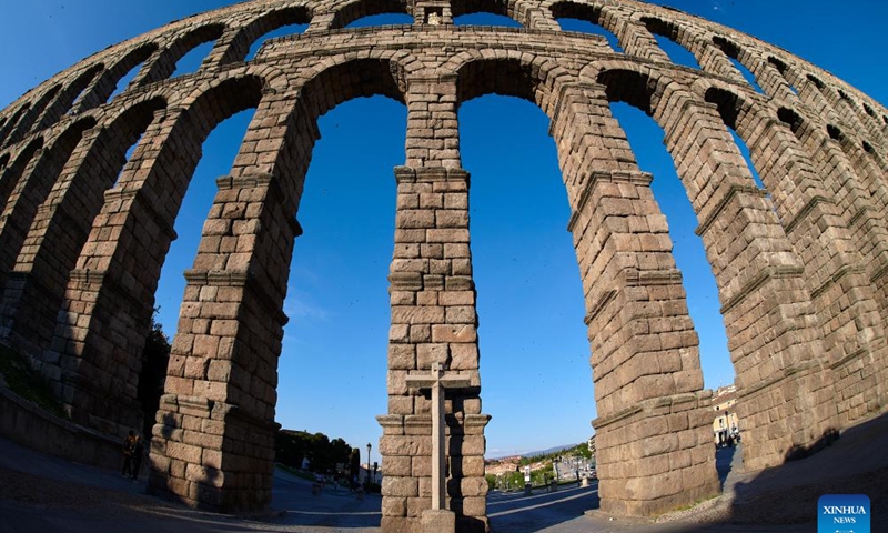  Photo taken on May 10, 2022 shows the Roman aqueduct in Segovia, Spain. Segovia is famous for its Roman aqueduct, as well as ancient churches and castles. The old town of Segovia and its aqueduct were listed as the World Heritage by the UNESCO in 1985. (Photo by Pablo Morano/Xinhua)