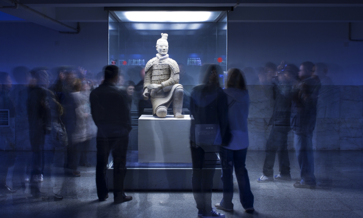 A man visits a cultural relic from Han Dynasty (206BC-AD220) displayed at Nanjing Museum in East China's Jiangsu Province on May 15. 
Photos: VCG