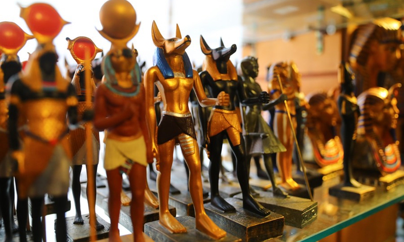Photo taken on May 14, 2022 shows the replica of the statue of god Anubis at the souvenir store of Egyptian Museum in Cairo, Egypt. (Photo: Xinhua)